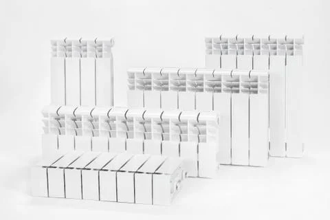 Samples of white radiators on an isolated background. Stock Photos