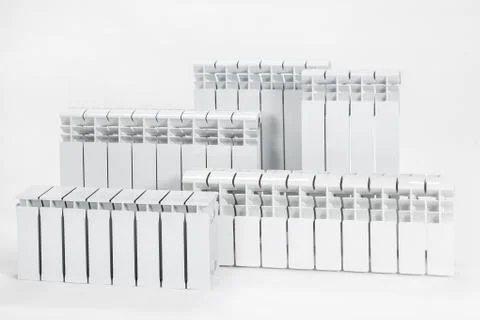Samples of white radiators on an isolated background. Stock Photos