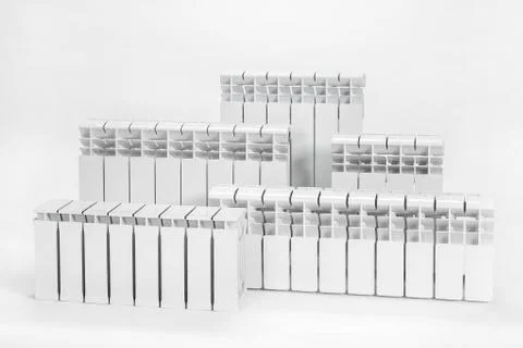 Samples of white radiators on an isolated background. Stock Photos