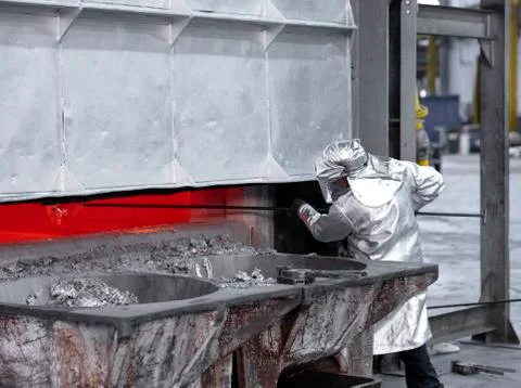 Sampling aluminum melted before casting Stock Photos