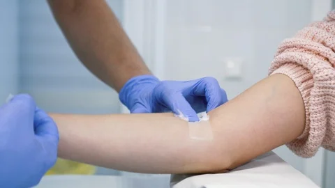 Sampling blood process finish. Closing wound after medical procedure Video stock 121624559