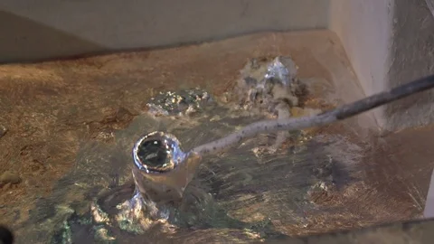 Sampling liquid molten aluminum for laboratory testing in Metallurgical plant Stock Footage 121024167