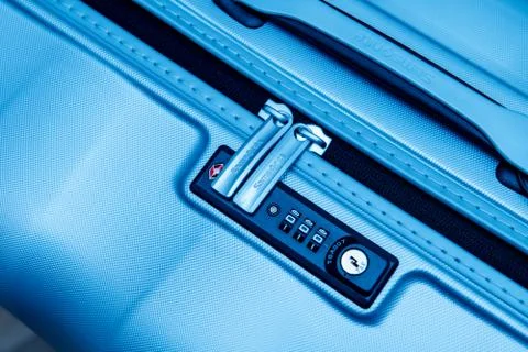 Samsonite suitcase briefcase with focus on the logo and TSA comb Stock Photos
