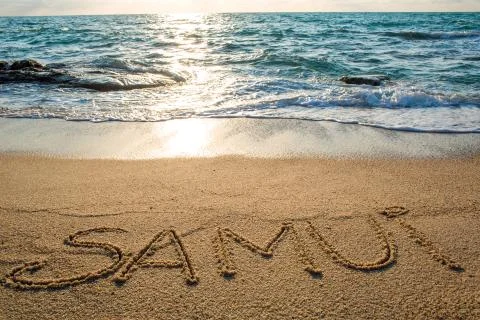 Samui written on the sand Stock Photos