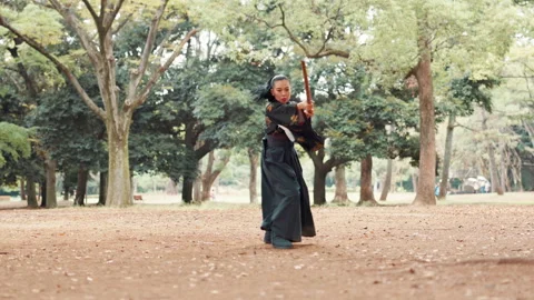 Samurai, forest and woman training in park with sword, self defense and fight Stock Footage 292967405