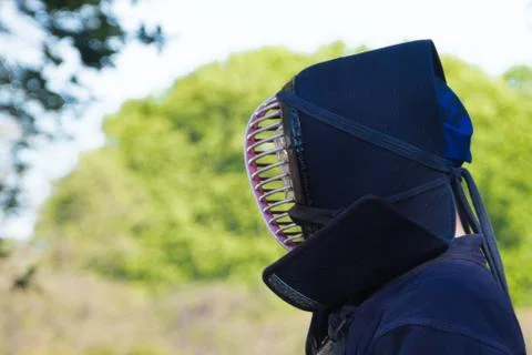 Samurai head against blured background Stock Photos