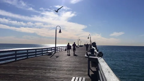 San Clemente pier couple Stock Footage