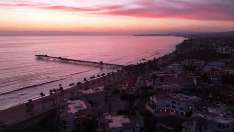 San Clemente Pier Push Forward Aerial at Sunset Along Orange County Coastline Stock Footage 332946011
