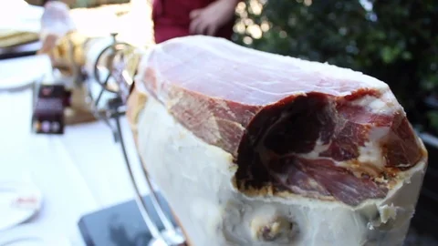 San daniele raw ham ready to be cut with a knife Stock Footage 109280330