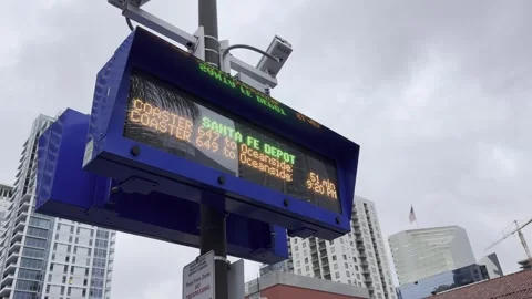 SAN DIEGO, CA - MARCH 12, 2025 - Digital departure board at Santa Fe Depot Stock Footage 345265581