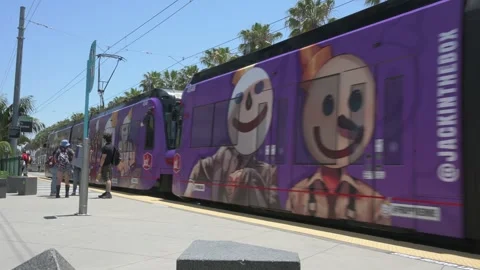 San Diego Comic-Con 2023 - Trolley, wipe to convention center Stock Footage 246634537