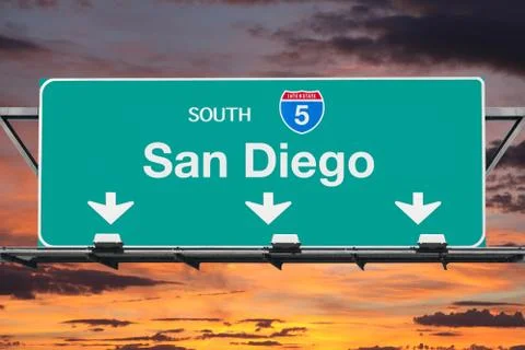San Diego Interstate 5 South Highway Sign with Sunrise Sky Stock Photos