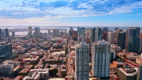 San Diego skyline beneath a patterned cloud layer. Towers and low rooftops Stock Footage 346724525