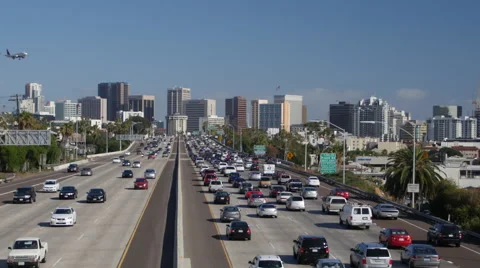 San Diego traffic with an Airplane plane flying over Stock Footage