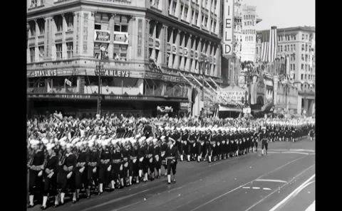SAN FRANCISCO - 1945 - Navy in several groups marching down the street. Navy men Stock Footage 308102065