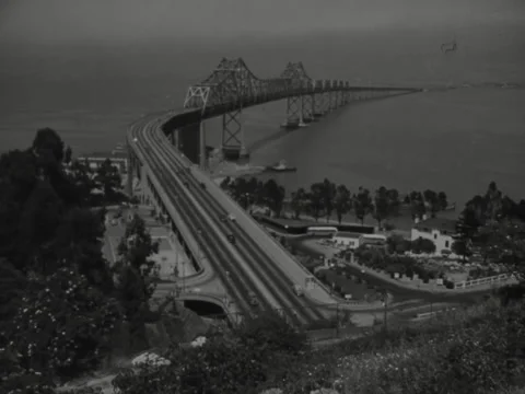 San Francisco, CA - 1945: Bay Bridge seen from shore Stock-Footage 229799448