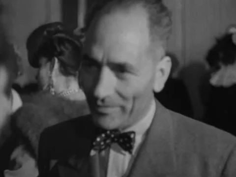 San Francisco, CA - 1945: Unknown men and woman chat at SF Conference Stock Footage 229799528