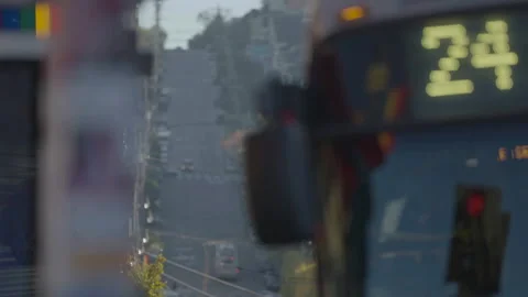 San Francisco, CA - Dec 10, 2024: Steep road background with bus foreground Stock Footage 333576078