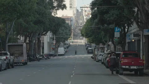 San Francisco, CA - Dec 15, 2024: Steep street with passing cars Stock Footage 333580805