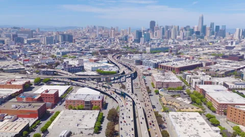 San Francisco Freeway Interchange Aerial Pullback With Downtown Skyline Video stock 335346974