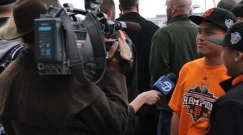 San Francisco Giants Fans Being Interviewed Stock Footage