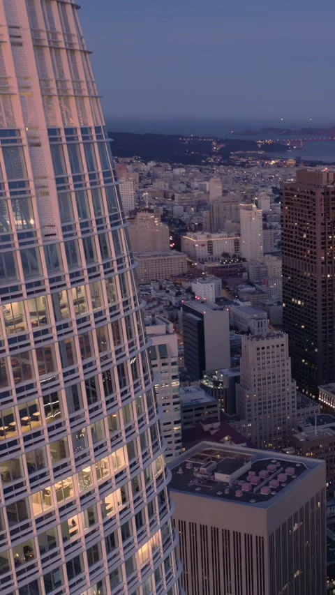 San Francisco skyline at dusk, featuring the Salesforce Tower.  USA Stock Footage 313778475