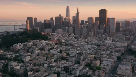 San Francisco skyline at sunset, with dense housing below. USA Stock Footage 313637805