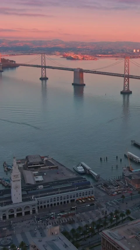San Francisco skyline at sunset, featuring the Bay Bridge. USA Stock Footage 313604048