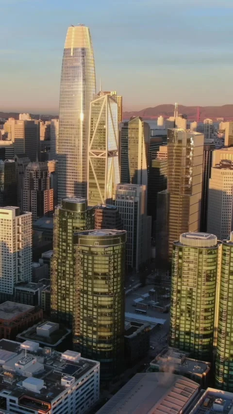 San Francisco skyline at sunset, featuring Salesforce Tower.  USA Stock Footage 313779855