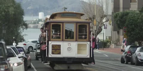 San Francisco Trolley Cable Car Passing People Wave Slow Motion Red One MX 3k Stock Footage 11655643