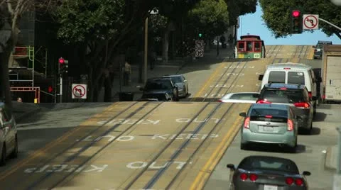 San Francisco trolley cable car running on a street slope hill Stock Footage