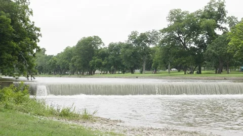 San Gabriel River running over dam in San Gabriel Park Georgetown Texas Stock Footage 336868219