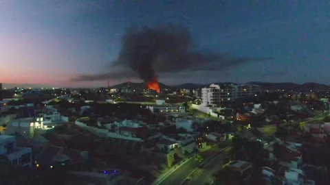 SAN JOSE DEL CABO BCS MEXICO-2023: A City At Night With A Large Plume Of Smoke Stock Footage 245853647