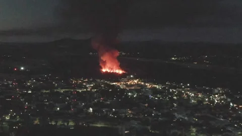 SAN JOSE DEL CABO BCS MEXICO-2023: A Large Fire Blazing In The Sky Over A City Stock Footage 245853845