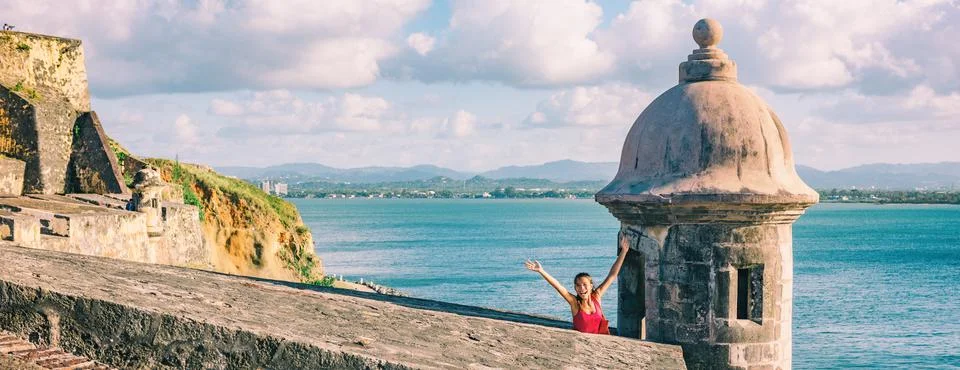 San Juan Puerto Rico travel happy tourist woman waving open arms in happiness at Stock Photos