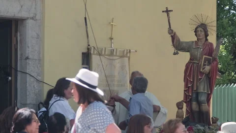 San Vito procession with priest ringing bell in Ricigliano Stock Footage 339359258