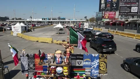 San Ysidro Border Crossing with trump piggy bank and mexican flag Video stock 303860853