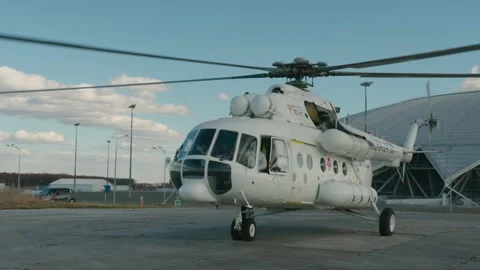 The sanaviation helicopter is preparing for takeoff Stock Footage 149816109
