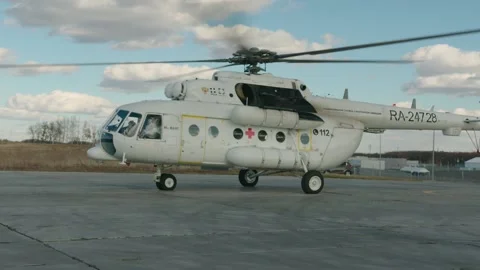 The sanaviation helicopter is preparing for takeoff Stock Footage 150151864