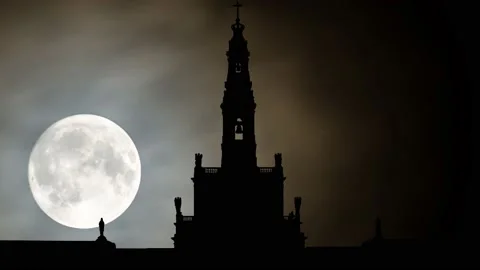 Sanctuary of Our Lady of Fatima, Time Lapse by Night with Full Moon, Portugal Stock Footage 130586472