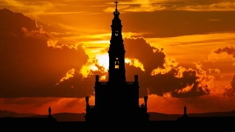 Sanctuary of Our Lady of Fatima, Time Lapse at Sunset with Red Sun and Fiery Sky Stock Footage 130586589
