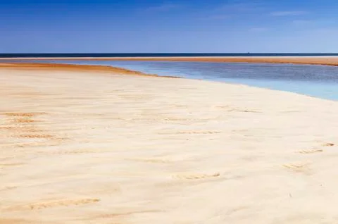 Sand and ocean Stock Photos