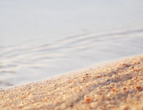 Sand and water Stock Photos