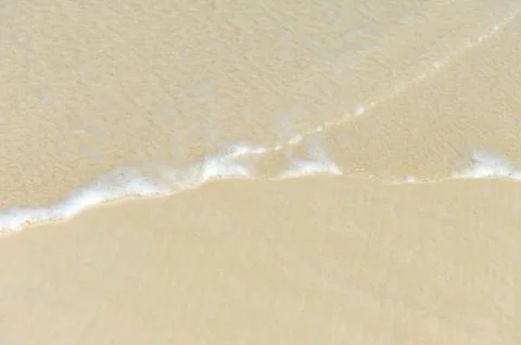 Sand and wave background 写真素材