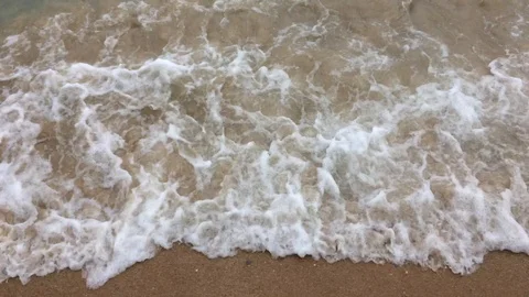 Sand and wave on the beach background Stock Footage 126683918