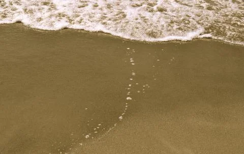 Sand and waves 스톡 사진