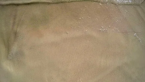 Sand and waves on shore Stock Footage 103317185