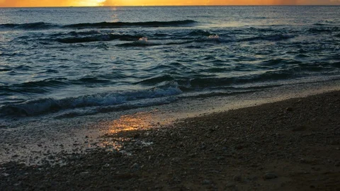 Sand And Waves On Sunset Beach. slow motion. Stock Footage 101472119