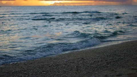 Sand And Waves On Sunset Beach. slow motion. Stock Footage 101473097