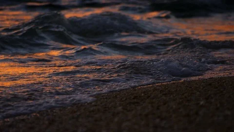 Sand And Waves On Sunset Beach. slow motion. Stock Footage 101477379